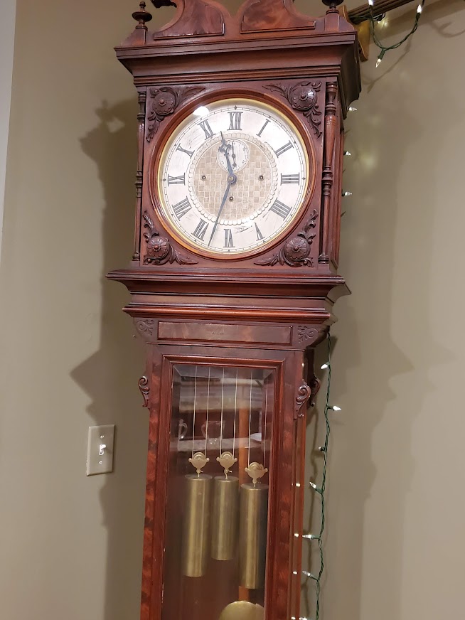 A grandfather clock prepared for moving